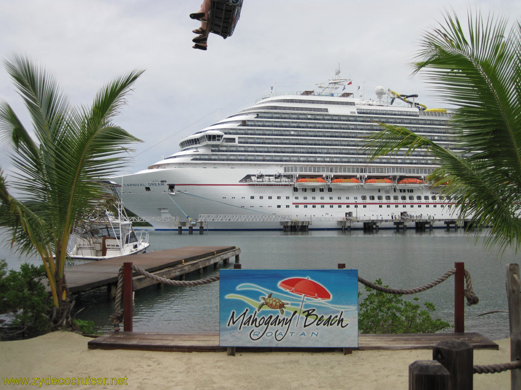 039: Carnival Conquest, Roatan, Carnival Dream posing behind the Mahogany Beach sign, 