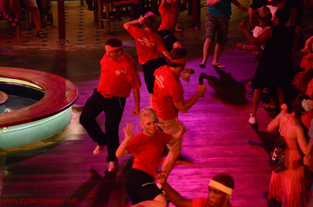 218: Carnival Conquest, Roatan, Deck party, CD Noonan doing a whacky dance step, 