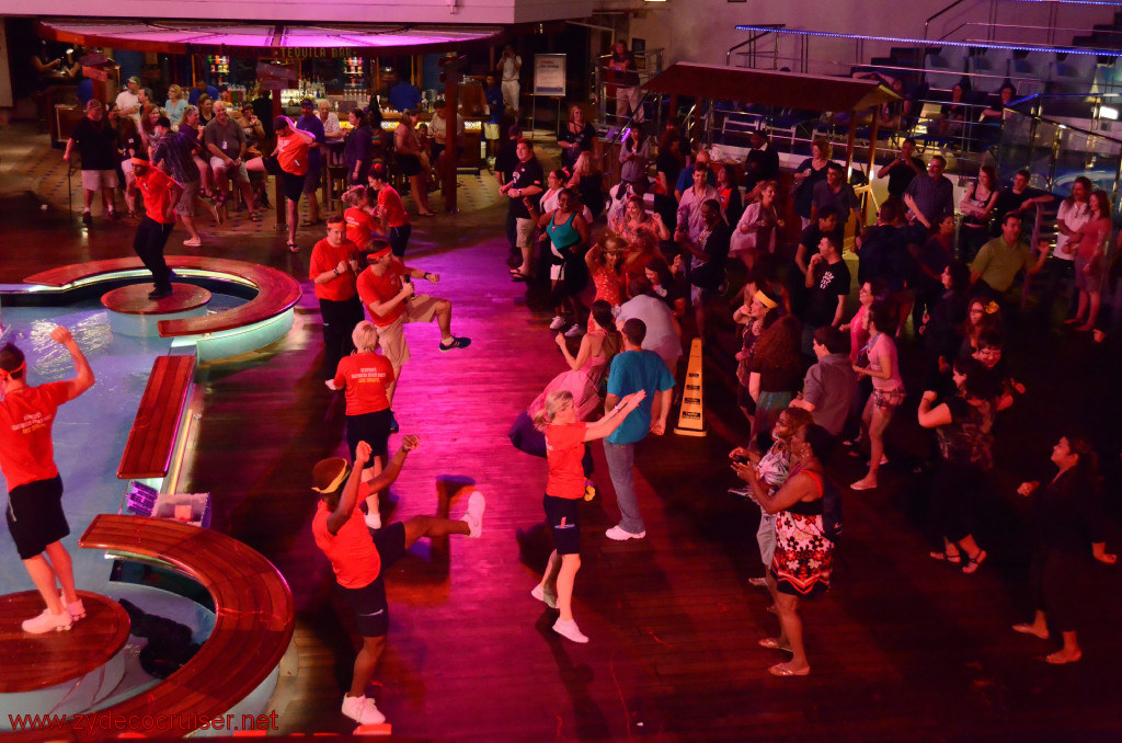 224: Carnival Conquest, Roatan, Deck party, CD Noonan doing a whacky dance step, 