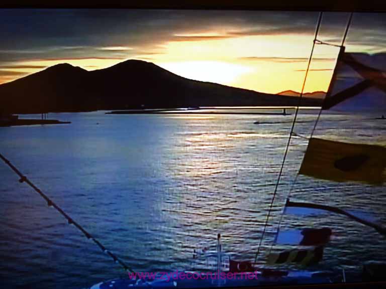 3368: Carnival Dream in Naples. Looking at sunrise on the TV in the cabin.