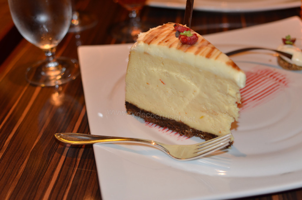 026: Carnival Sunshine Fahrenheit 555 Steakhouse, Cheesecake with Hazelnut Biscuit, using to fork to show scale