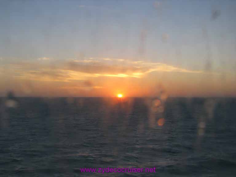 004: Carnival Fantasy, John Heald Bloggers Cruise 2, Progreso, Sunrise through a dirt window - Approaching Progreso