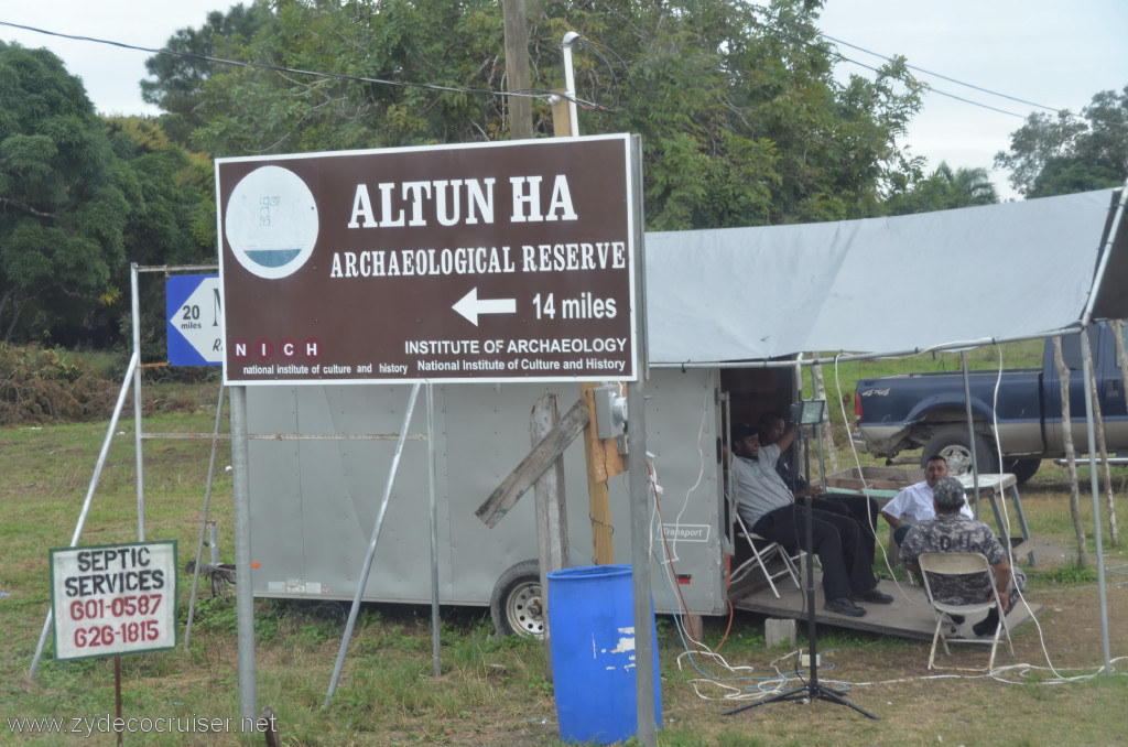 159: Carnival Conquest, Belize, Belize City Tour and Altun Ha, a check point, and a sign for septic services