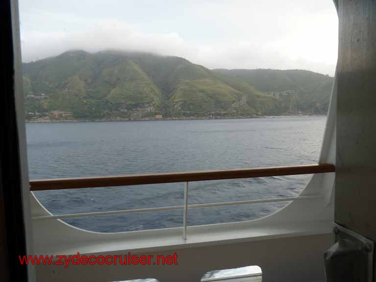 5542: Carnival Dream leaving Messina - View from our Cove Balcony cabin