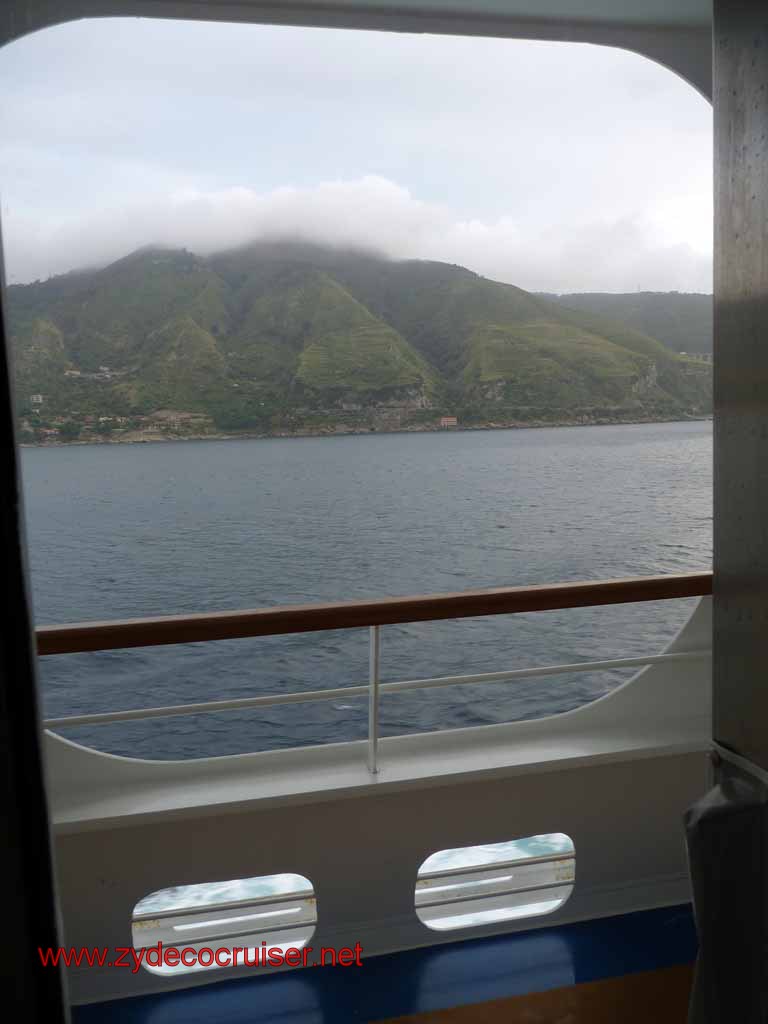 5545: Carnival Dream leaving Messina - View from our Cove Balcony cabin