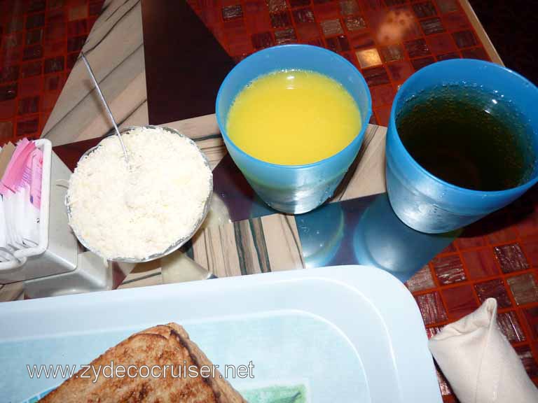 5610: Carnival Dream - Breakfast of Champions - OJ, Tea, Parmesean cheese, and toast.