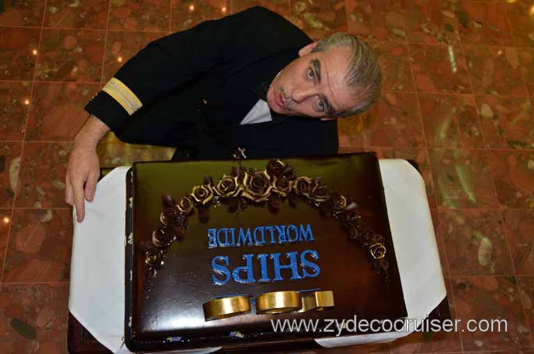 498: Carnival Magic Inaugural Cruise, Grand Mediterranean, Venice, Dinner, Ken Byrne "carrying" Carnival's 100th Ship Commemorative Cake