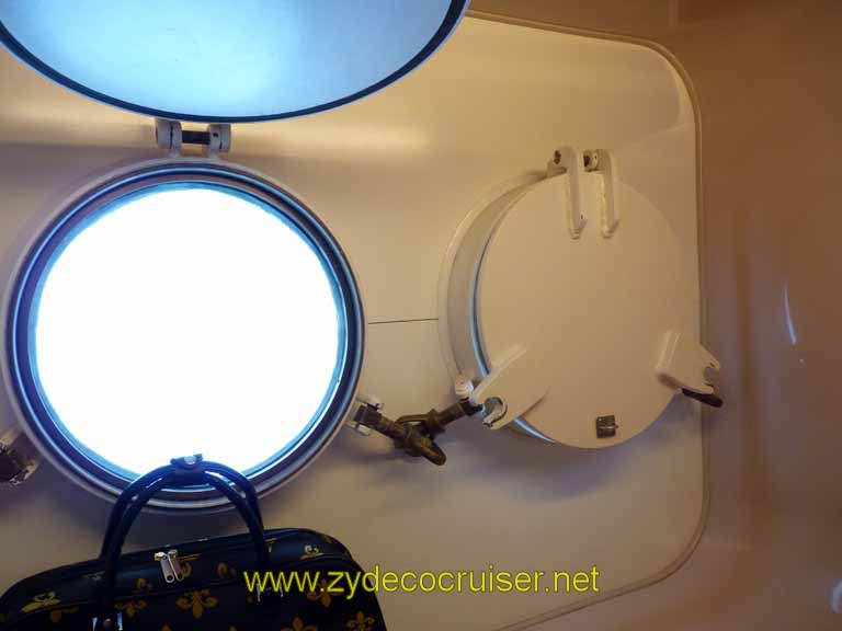 213: Carnival Sensation, Freeport, Bahamas, the porthole covers do close